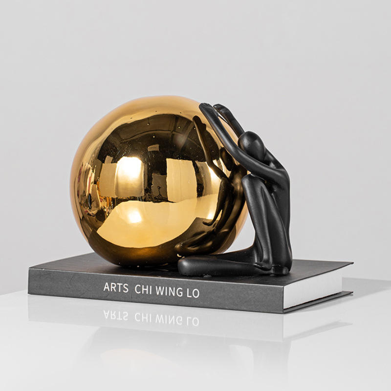 Holding Metal Golden Ball Statue - Image 4